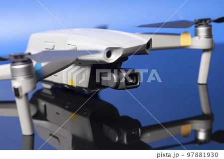 quadcopter drone aerial camera on dark background. quadcopter drone aerial camera on dark background. 97881930