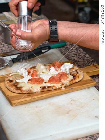 Rectangular shape and thick hand made romana's pizza Rectangular shape and thick hand made romana's pizza 97883160