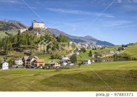 Idyllic landscape of Scuol Tarasp village, Engadine, Swiss Alps, Switzerland 97883371