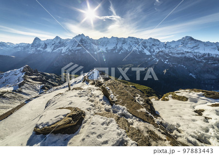 Top of the Schilthorn and view of Bernese Swiss alps, Switzerland Top of the Schilthorn and view of Bernese Swiss alps, Switzerland 97883443