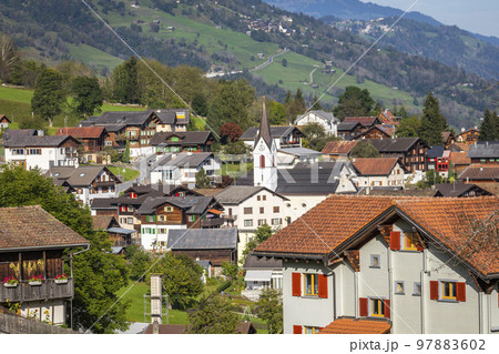 Idyllic landscape of village in Engadine valley, Swiss Alps, Switzerland Idyllic landscape of village in Engadine valley, Swiss Alps, Switzerland 97883602