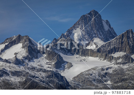 Dramatic Bernese swiss alps as seen from Nufenen Pass, Switzerland 97883718