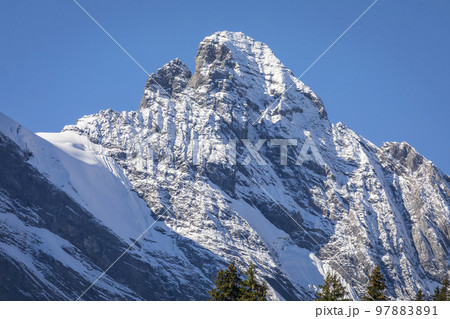 Top of the Schilthorn and view of Breithorn and Bernese Swiss alps, Switzerland 97883891