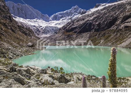 Llaca lake in Cordillera Blanca with snowcapped Andes, Ancash, Peru 97884095