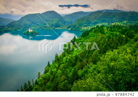 Lake Bled and Santa Maria Church from above, idyllic landscape of Slovenia Lake Bled and Santa Maria Church from above, idyllic landscape of Slovenia 97884742