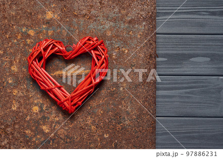 Heart shape on rough rusty metal background 97886231
