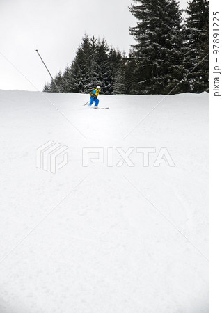 woman skier on the slope 97891225