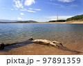 The Barcena reservoir with the chimneys of Compostilla thermal power station at background in Cubillos del Sil, el Bierzo, Castile and Leon, Spain. 97891359