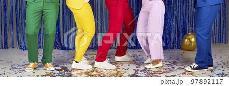 Legs of different young men and women who are having fun and partying at disco party. 97892117