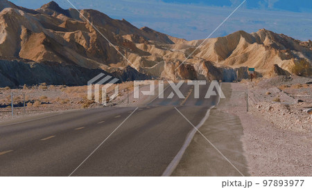 Lonesome street through Death Valley in California Lonesome street through Death Valley in California 97893977