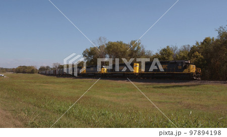 Slow freight train in Oklahoma Slow freight train in Oklahoma 97894198