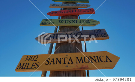 Direction signs to famous cities at Route 66 Direction signs to famous cities at Route 66 97894201