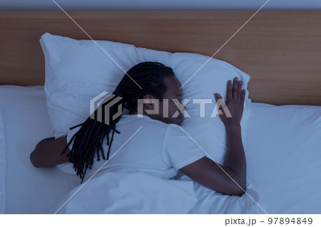 Deep Sleep. Above Shot Of Black Guy Sleeping In Bed At Home 97894849
