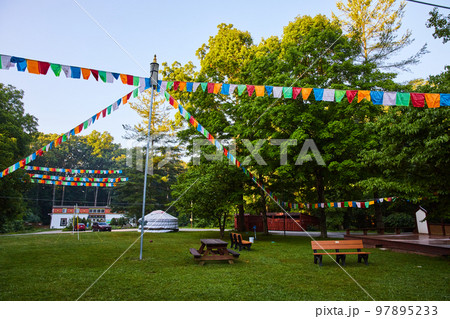 Cultural Center with Buddhist prayer flags on ropes Cultural Center with Buddhist prayer flags on ropes 97895233