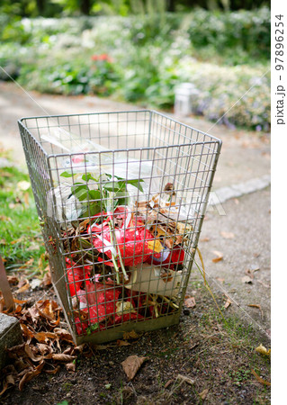 waste garbage basket in a cemetery waste garbage basket in a cemetery 97896254