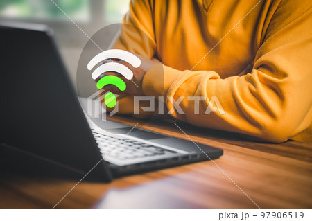 Man using a computer laptop to connect to wifi but wifi signal .is very weak, and waiting to loading digital business data form website, concept technology of waiting for connect to wifi. 97906519