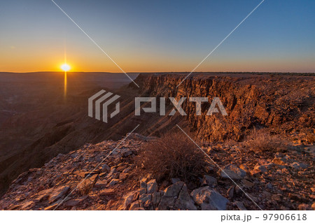 Sunset over fish river canyon Sunset over fish river canyon 97906618