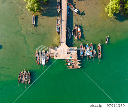 Aerial view of Bo Chet Luk port Harbour with long tail boats, in Satun Geopark, Thailand 97911329