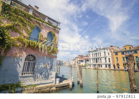 Waterfront in Venice Italy with ivy climbing Waterfront in Venice Italy with ivy climbing 97912811