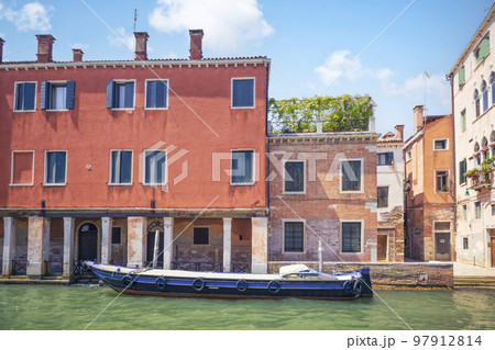 Large fishing boat on a waterfront 97912814