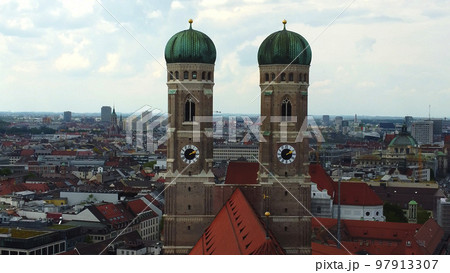 Most famous church in Munich - the Frauenkirche Cathedral in the historic district - aerial view Most famous church in Munich - the Frauenkirche Cathedral in the historic district - aerial view 97913307