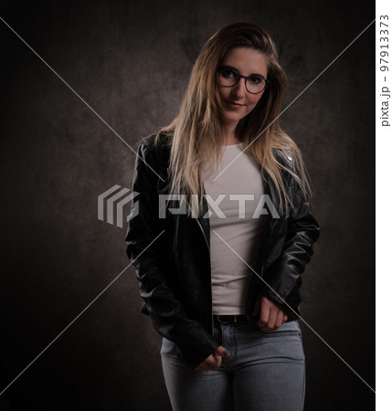 Close-up shot of a blonde beautiful woman in a studio 97913373