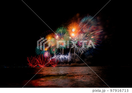 Colorful fireworks of various colors at night with celebration and anniversary concept Colorful fireworks of various colors at night with celebration and anniversary concept 97916713
