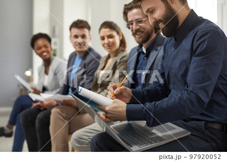 People talk to each other during break on business lecture, share experiences and discuss work. People talk to each other during break on business lecture, share experiences and discuss work. 97920052