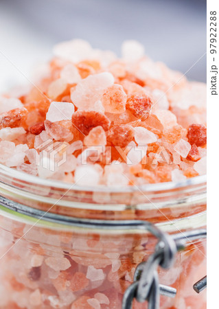 Pink himalayan salt in jar. 97922288