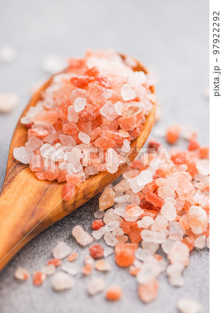 Pink himalayan salt in wooden spoon. Pink himalayan salt in wooden spoon. 97922292