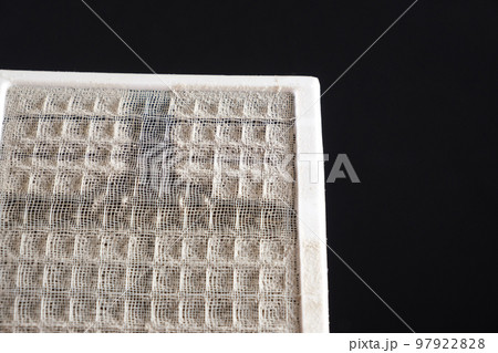 Dusty air conditioner filter. A lot of dust on the net, asthma and allergy to dust, cleaning of filters 97922828