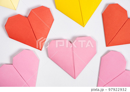 Origami for Valentine's Day - hearts made of paper on a white background do it yourself 97922932