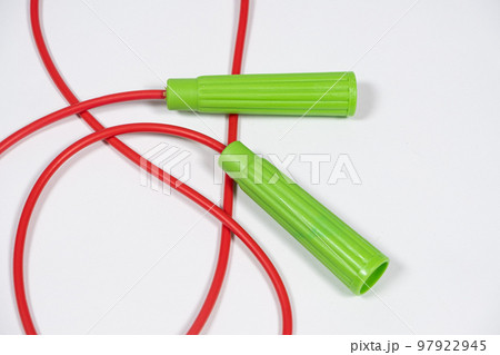 Red green rope on white background close-up 97922945