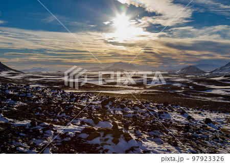 Sunset and first snow in the mountains of north-east Iceland 97923326