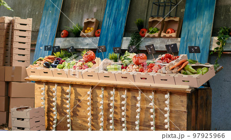 Street festival with farmers market counter to sell fresh produce, empty greenmarket stand with various fruits and veggies. Colorful raw products homegrown, vegetables on marketplace stall. Street festival with farmers market counter to sell fresh produce, empty greenmarket stand with various fruits and veggies. Colorful raw products homegrown, vegetables on marketplace stall. 97925966