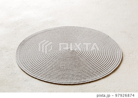 Perspective view of round tablecloth for food on cement background. Empty space for your design 97926874