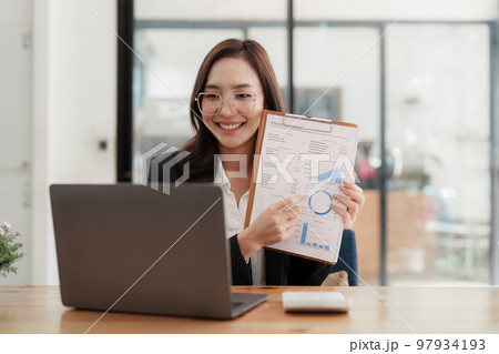 Administrator business people financial inspector making report calculating balance. Internal Revenue and Accounting concept 97934193