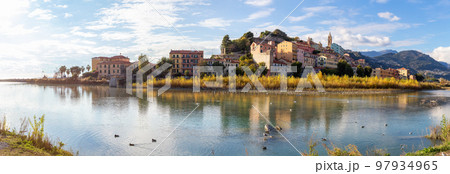 Old Residential Homes near river and sea in Ventimiglia, Italy. 97934965