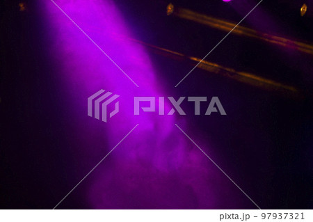 Background of the concert stage from purple smoke on a black background. 97937321