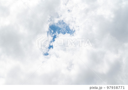 Beautiful white fluffy clouds in blue sky. Nature background from white clouds in sunny day Beautiful white fluffy clouds in blue sky. Nature background from white clouds in sunny day 97938771