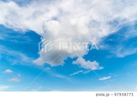 Beautiful white fluffy clouds in blue sky. Nature background from white clouds in sunny day Beautiful white fluffy clouds in blue sky. Nature background from white clouds in sunny day 97938775