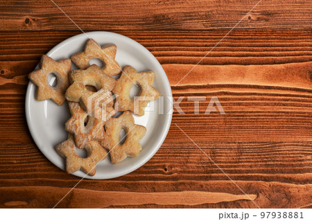 Homemade pastry concept. Tea cookies on wooden background 97938881