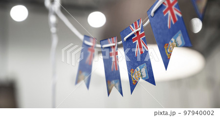 A garland of Falkland Islands national flags on an abstract blurred background A garland of Falkland Islands national flags on an abstract blurred background 97940002