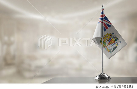 A small British Antarctic Territory flag on an abstract blurry background A small British Antarctic Territory flag on an abstract blurry background 97940193