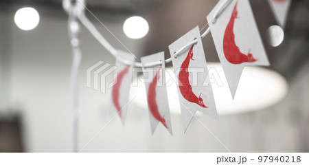 A garland of Easter Island national flags on an abstract blurred background 97940218