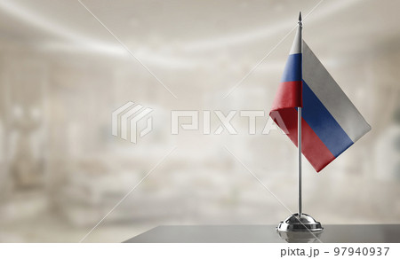 A small Slovakia flag on an abstract blurry background A small Slovakia flag on an abstract blurry background 97940937