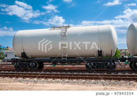Railway tank stands on the tracks at the station. Railway tank stands on the tracks at the station. 97943354