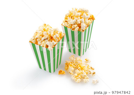Two green white striped carton buckets with tasty cheese popcorn, isolated on white background 97947842