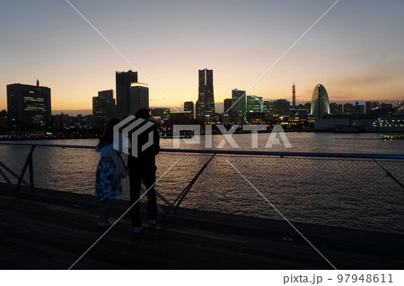 Late evening in Minato Mirai, Yokohama. Guy and girl on the roof International Passenger Terminal 97948611