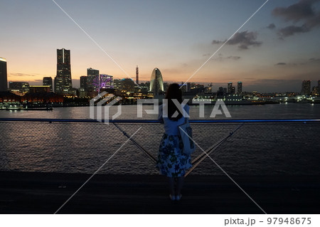 The enchantment of harbor lights. Yokohama after sunset The enchantment of harbor lights. Yokohama after sunset 97948675